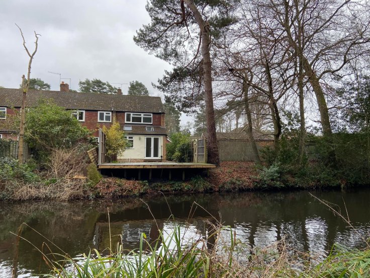 Small path off to the right opposite this final house